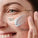 This image shows a close-up of a person applying Fresh Waves, a skincare product with a cream-gel texture, to their cheek. The annotations highlight its key features:
Refreshingly light feel.
Instantly cooling and soothing effect.
The product is designed to provide a hydrating and calming experience, perfect for refreshing the skin.